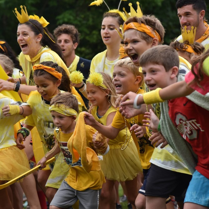 Campers dressed in yellow for a color war.